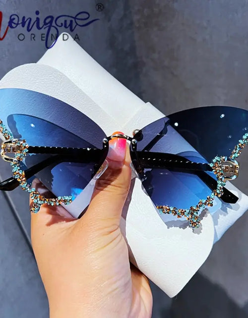 Bild in Galerie-Viewer laden, Diamant-Schmetterlings-Sonnenbrille

